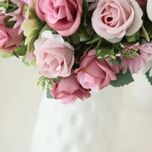 Artificial silk rose flower bouquet close up detail for home wedding floral decor display