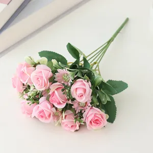 Close up view of artificial pink rose bouquet, silk floral arrangement for home decor detail.