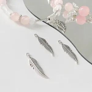 Alloy feather charm detail for DIY handmade jewelry crafting, delicate cute sweet style.