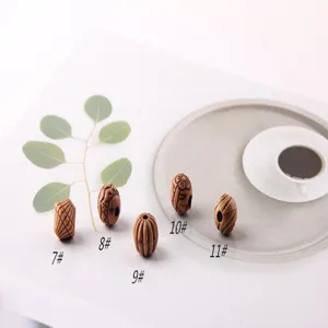 Retro ethnische Holzperlen mit Loch DIY Zubehör, ideal für handgemachte Ohrringe und Schmuck.