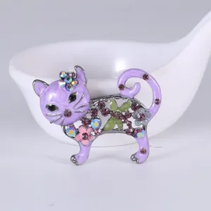 Exquisite purple enamel cat brooch featuring colorful rhinestones and floral details, ideal for accessory.