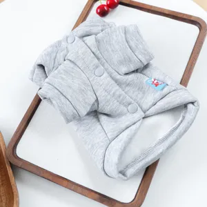 Detail view of grey solid pet dog hoodie sweater with snap buttons, neat and cute pet apparel.
