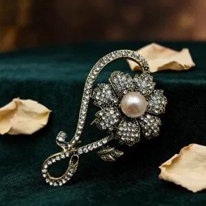 Exquisite vintage luxury rose flower brooch detail, featuring sparkling rhinestones.