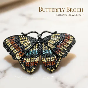 Vintage rhinestone butterfly brooch detail, black metal insect pin for suit decor.