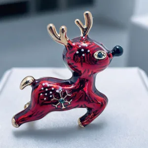 Broche renne de Noël, épingle élan émail rouge avec flocon cristal bijou festif