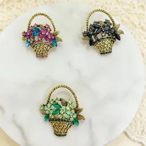 Vintage rhinestone flower basket brooch detailed view, exquisite alloy pin accessory for women.
