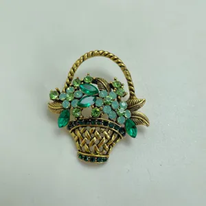 Exquisite vintage green rhinestone flower basket brooch detail view fashion clothing pin