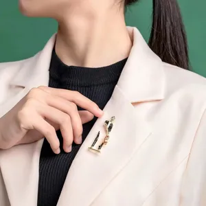 Stylish enamel fashion figure brooch for women, elegant lapel pin for coats and cardigans.