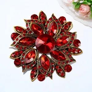 Red crystal flower brooch detail, vintage gold metal alloy pin, elegant coat accessory.