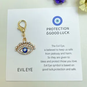 Pendentif amulette œil maléfique doré avec strass, joli porte-clés accessoire de sac bijou.
