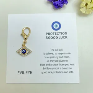 Pendentif charme strass mauvais œil, accessoire porte-clés en métal doré avec cristaux scintillants.