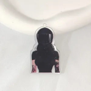 Detailed view of the anime motorcycle rider acrylic keychain pendant, cute DIY cartoon bag accessory