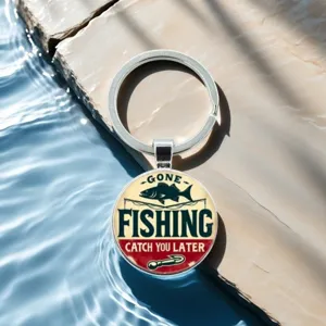 Vintage fishing themed glass cabochon keychain, metal keyring accessory for outdoor sports lovers.