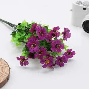 Artificial purple flower bouquet with eucalyptus leaves for home and outdoor decoration.