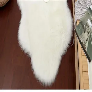 Soft white fluffy faux fur rug detail, cozy plush floor mat for bedroom or living room decor.