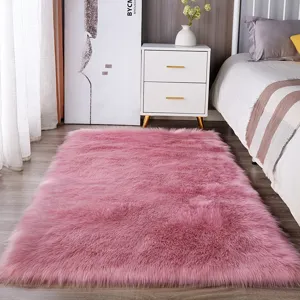 Roze pluche pluizige vloerkleed voor slaapkamer bedrand zachte imitatie kasjmier matje.