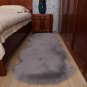 Grey faux sheepskin rug detail shot, fluffy plush area rug for bedroom floor and home decor.