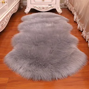 Gray faux sheepskin plush furry rug detail shot, perfect for cozy bedroom floor decor nicely.