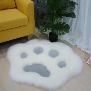White plush cat paw rug for bedroom and living room decor, soft fluffy floor mat.