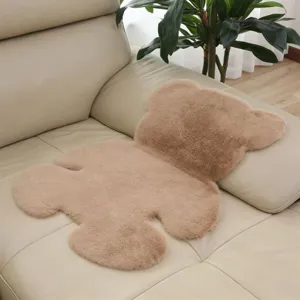 Cozy plush bear rug detail shot, soft faux fur bedroom bedside decorative mat for home.