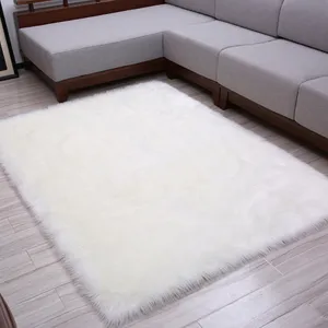 Close-up detail of the soft white fluffy faux fur rug placed nicely in modern living room.