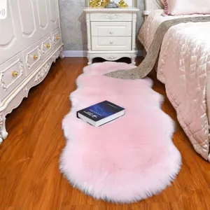 Pink faux wool plush rug, fluffy bedside carpet and living room floor mat for home decor.