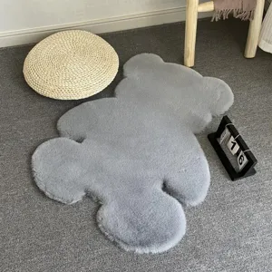 Grey faux rabbit fur bear rug detail view, soft plush bedside mat for bedroom and kids room.