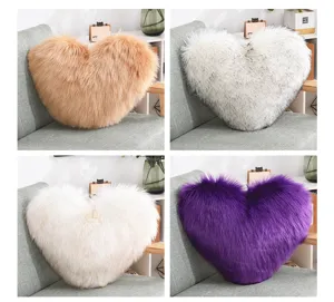 Heart shaped faux fur throw pillow detail showing plush texture and vibrant color options for home decor.