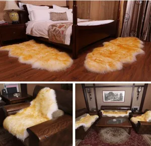 Detailed view of genuine sheepskin rug and sofa cushion, soft fluffy wool mat for cozy home.