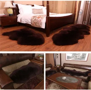 Detailed view of dark brown sheepskin rug and sofa cushion in home bedroom and living room.