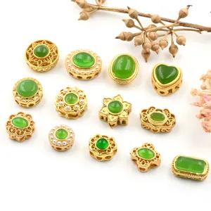 Gold-plated metal DIY jewelry spacer beads with green synthetic stone for custom bracelets.