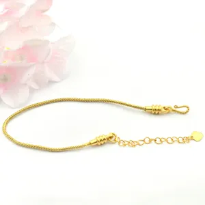 Ancient gold DIY snake bone bracelet chain detail view, featuring clasp and extension chain.
