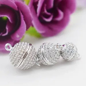 Micro-paved zircon magnetic ball clasp for DIY jewelry, sparkling stone detail closeup.