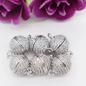 Sparkling pave zircon magnetic ball clasp detail for DIY jewelry making, secure closure.