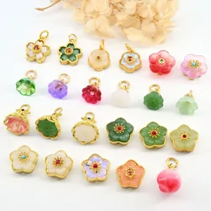 Assorted gold-plated jade and stone flower charms, exquisite DIY jewelry pendant bead accessories.