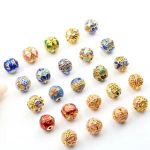 Cuentas huecas cloisonne 10mm chapadas en oro para bricolaje joyeria abalorios detalles.