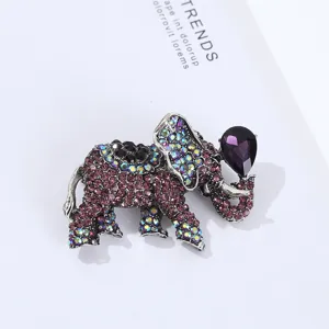 Exquisite rhinestone elephant brooch featuring purple crystal teardrop and shiny gems for women.