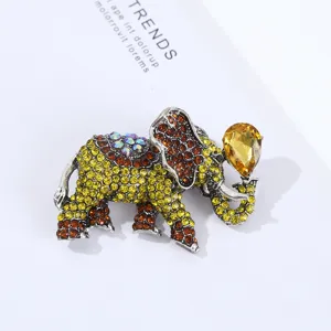 Close-up detail of vintage crystal rhinestone elephant brooch, alloy animal jewelry.