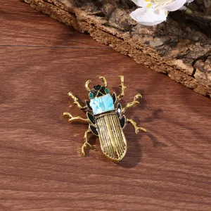 Vintage beetle insect brooch pin with blue resin and metallic finish for women daily wear accessory.
