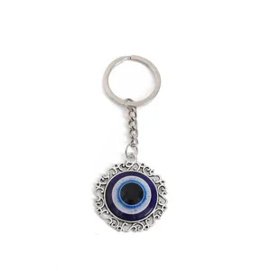 Portachiavi malocchio in metallo argentato amuleto blu portafortuna ciondolo vintage