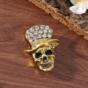 Vintage gold tone skull brooch with crystal top hat Halloween gothic fashion jewelry accessory
