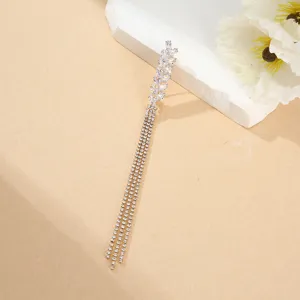 Elegante gioiello lungo in strass con motivo spiga di grano e nappe, design brillante.
