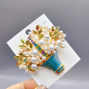 Vintage enamel flower basket brooch with faux pearls and colorful rhinestones for women fashion.