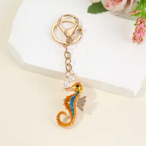 Zee paardje sleutelhanger, emaille legering tas charm en creatief sleutelring accessoire.