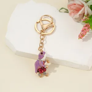 Detailed close-up view of a sparkling rhinestone animal alloy keychain pendant display.