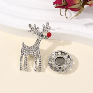 Gedetailleerd overzicht van strass rendier magneet broche, fonkelende kristallen en sterke basis.