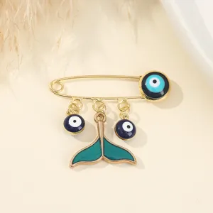 Broche œil maléfique doré avec pendentif queue de poisson mignonne épingle bijoux