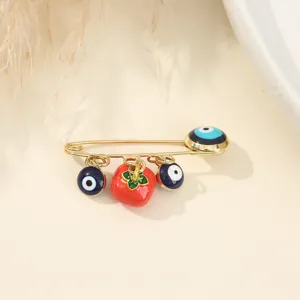 Broche œil maléfique avec pendentif fruit rouge, épingle de sûreté dorée hommes et femmes