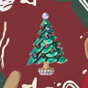 Detailed closeup view of a sparkling green Christmas tree brooch with colorful rhinestones.