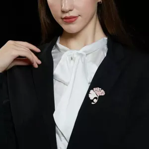 Exquisite four-leaf clover brooch detail, featuring pink crystal and white pearl for blazer.